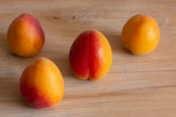 apricot berries on wooden background