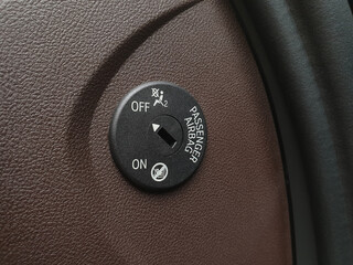 Airbag deactivation lock close up. Lock disconnect in off position