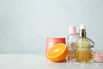 Natural cosmetics with ingredients on table