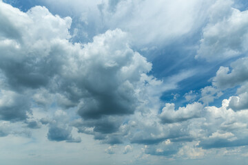 Rain clouds on gray, gloomy sky.