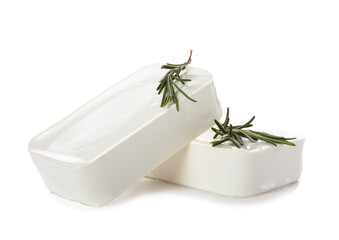 Obraz na płótnie Canvas Tasty feta cheese with herbs on white background