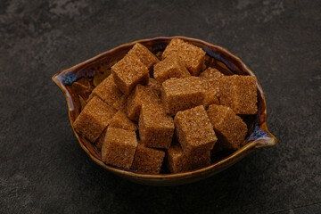 Cane sugar cubs in the bowl
