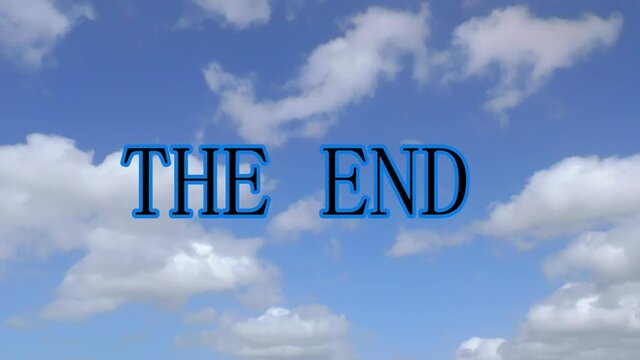 word text on blue sky clouds  time-laps the end 4k