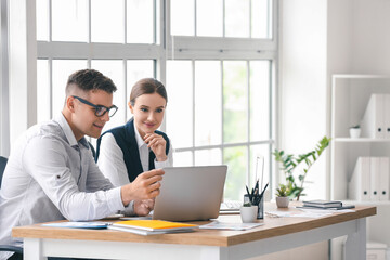 Young business people working in office