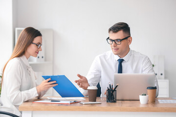 Young business people working in office