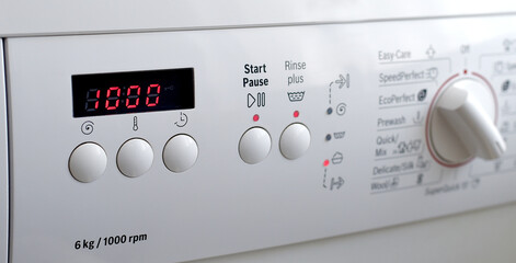 close-up control panel of a washing machine