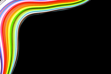 Abstract color wave curl rainbow strip paper on black background