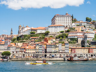 PORTO, PORTUGAL - JUNE 11, 2019: Ribeira neighborhood. It is the second-largest city in Portugal. It was proclaimed a World Heritage Site by UNESCO in 1996.