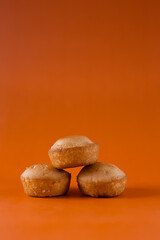 Fototapeta na wymiar Bread on the orange background