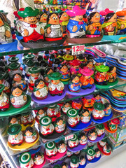 Fototapeta na wymiar Ceramic products on tray street vendor
