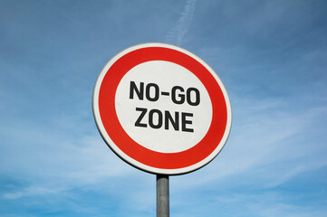No-go zone - warning traffic sign and roadsign is marking forbidden and prohibited area in city,...