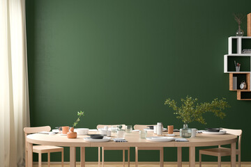 Blank green wall mock up in the dinning room with served table. 3d render - obrazy, fototapety, plakaty