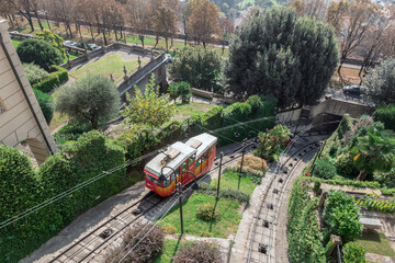 Red funicular in the old city of Bergamo - obrazy, fototapety, plakaty