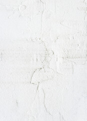 High detailed fragment of white painted cement wall with scratches. Qualitative abstract background.