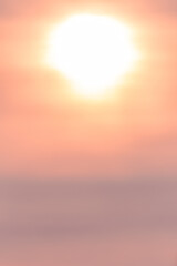 Obraz premium Sunrise on cloudy day abstract background portrait