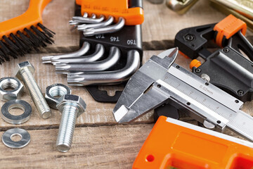 Fototapeta premium Different tools on the old background.