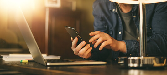 Man pointing on smartphone screen, male hands, close up