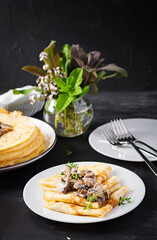 Pancakes with mushrooms.  Homemade baking. Maslenitsa week. Maslenitsa.