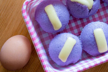 Ube puto with cheese. A Filipino style rice cupcake muffin with ube purple yam flavor. 