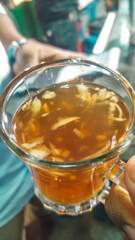 A cup of raw tea . A cup of ginger tea to help recovered immune system . Ginger tea to help covid19 recover .