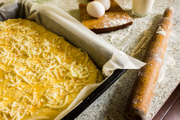 fresh Suluguni cheese pie prepared for baking