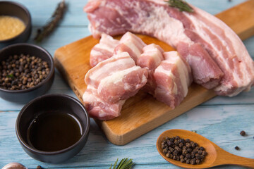 Raw pork on the wood floor