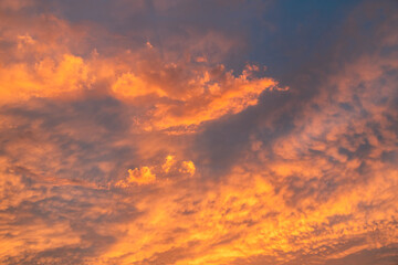 Beautiful bright sunset sky. Dramatic colorful clouds after sunset. Nature backgrounds.