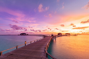 Amazing sunset sunrise sky and reflection on calm sea, Maldives beach landscape of luxury over...