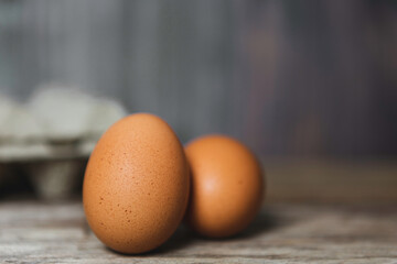 Two egg on wooden background soft focus