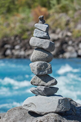 PETROHUE, CHILE - FEBRUARY 11, 2020: The waterfalls, rapids and tourists of Petrohue on a sunny day in the lake region of Chile, near of Puerto Varas. Turquoise water. Apachetas