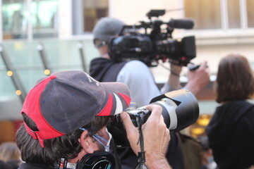 Sydney, NSW / Australia - June 6 2020: Black Lives Matter Protest March. Protesting Aboriginal deaths in custody and the death of. Photographer and video camera man recording the event