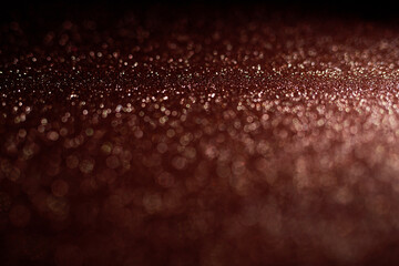 Pink glitter texture abstract background. Defocused bokeh.