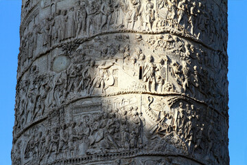 Details of the bas-relief of the Trajan column in Piazza Venezia, Rome. Blue sky background