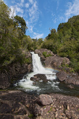 Naklejka na ściany i meble Panoramic view of the Chaica River Waterfall, Alerce Andino National Park, Puerto Montt, Chile