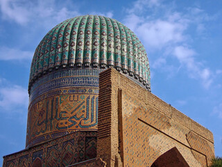 Close up view onto one of buildings of cathedral Mosque of Bibi Khanym, one of popular tourist sights in Samarkand, Uzbekistan. All of buildings richly decorated with traditional eastern ornaments