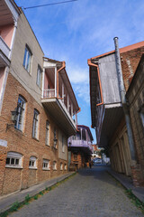 Georgia, the city of love Signagi. June 2019. Vintage fashionable wooden carved balconies in the old Georgian 