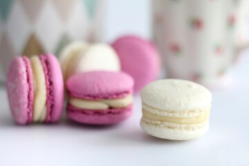 colorful macaroons on a wooden table