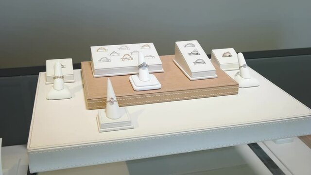 Beautiful video of engagement and wedding rings with diamonds. Panning video of the rings with diamonds.