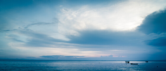 beautiful clouds over the sea. seascape, natural minimalistic background and texture, panoramic view banner. pastels tones