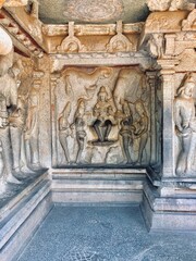 Bas relief rock cut sculptures of gods, people and animals are carved prominently in the monolithic cave temples at Mahabalipuram, Tamil nadu, India