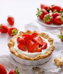 Tart with the addition of fresh strawberries and cream cheese close up view