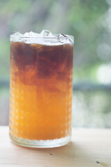 A glass of espresso shot mixed with orange juice