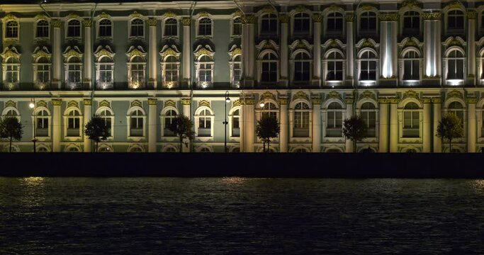 4K high quality night video of scenic illuminated architecture of Saint Petersburg city center, majestic Winter Palace Zimniy Dvorec, Neva River embankment in Russia's northern capital