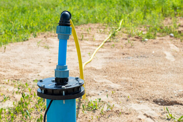 bright lighting. equipped well under water. Their PVC pipe is blue. Close-up