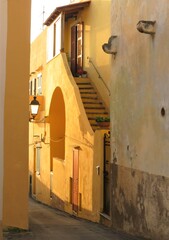 narrow street in the old town of Ventotene, Italy
