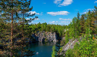Nature of Karelia. Pines and fir-trees on the shore of lake. Travel to Russia. North Karelia, Russian wild nature.