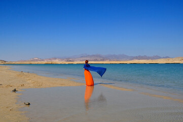 Young girl with a blue shawl in Ras Mohammed National Park, Egypt