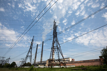 High voltage post. High-voltage tower and blue sky background