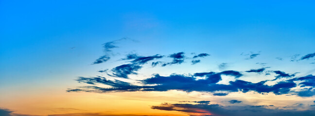 Plakat picturesque sky landscape background at sunset natural color of evening cloudscape panorama with sun below horizon ultra wide panoramic view