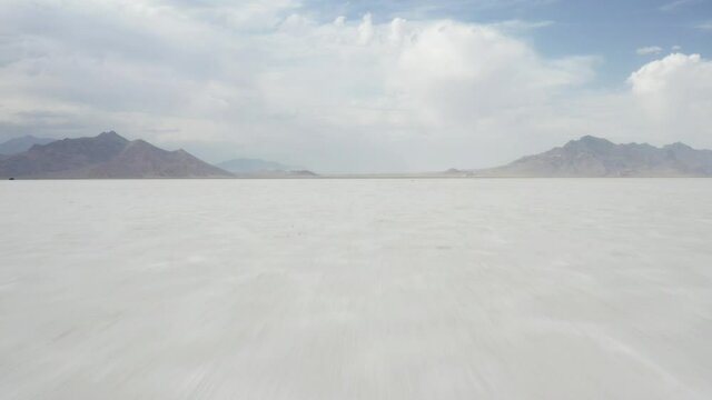 Cinematic aerial of Bonneville Salt Flats, white desert, landscape from another planet, scenic nature of Utah